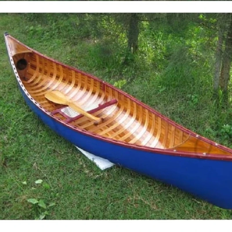Navy blue canoe | 300 cm carved wooden canoe with curved bow and ribs
Navy blue canoe | 300 cm carved wooden canoe with curved bow and ribs