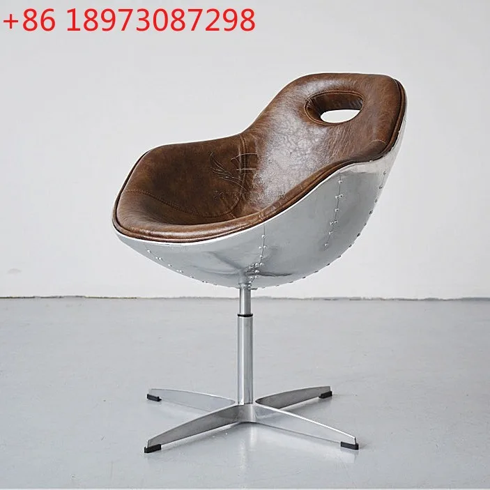 Креативный вращающийся одиночный стул из алюминиевой кожи, кресло для отдыха в индустриальном стиле
Креативный вращающийся одиночный стул из алюминиевой кожи, кресло для отдыха в индустриальном стиле