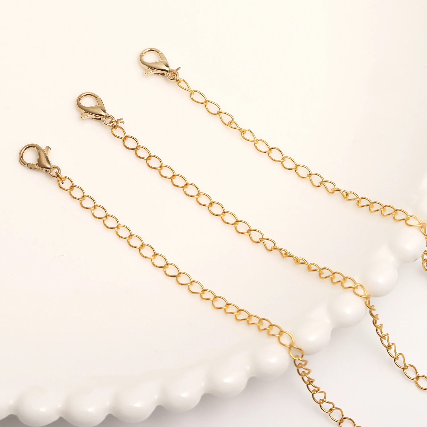 10pcs 14K Golden Plated Metal Tail Chain Extensions Adjusters Secure Double Lobster Clasps Ideal forJewelry Making Accessories
10pcs 14K Golden Plated Metal Tail Chain Extensions Adjusters Secure Double Lobster Clasps Ideal forJewelry Making Accessories