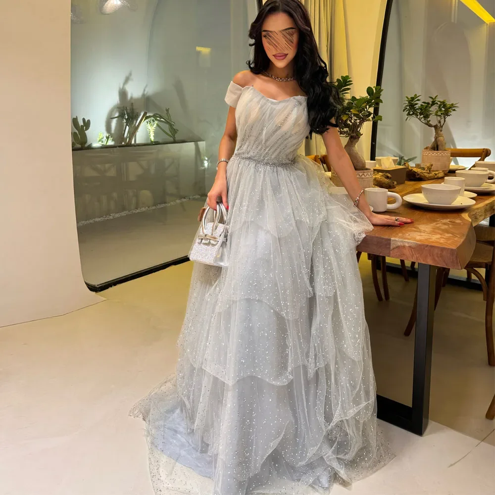 Blue Tulle Prom Dress Formal Maxi Dress Customized Sparkling Beaded Prom Dresses Off the Shoulder Ruffles Birthday Party Gown
Blue Tulle Prom Dress Formal Maxi Dress Customized Sparkling Beaded Prom Dresses Off the Shoulder Ruffles Birthday Party Gown
