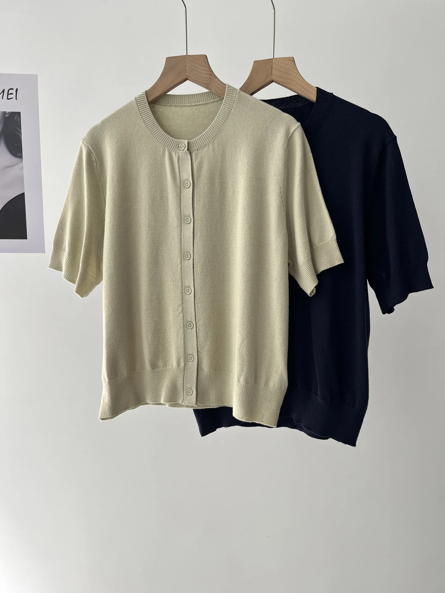Women's standard version knitted cardigan short-sleeved spring new product 011-0311
Women's standard version knitted cardigan short-sleeved spring new product 011-0311