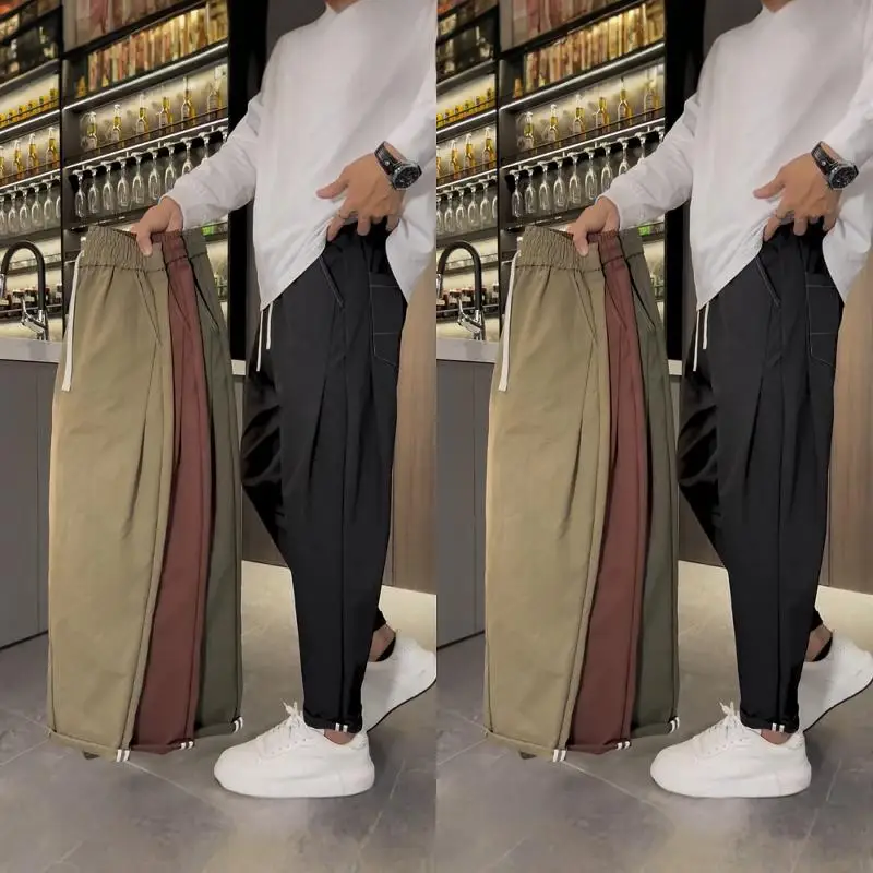 Новые осенние свободные мужские повседневные брюки классического кроя с высокой талией, удлиняющие ноги, модные брюки-харлан с прямой строчкой
Новые осенние свободные мужские повседневные брюки классического кроя с высокой талией, удлиняющие ноги, модные брюки-харлан с прямой строчкой