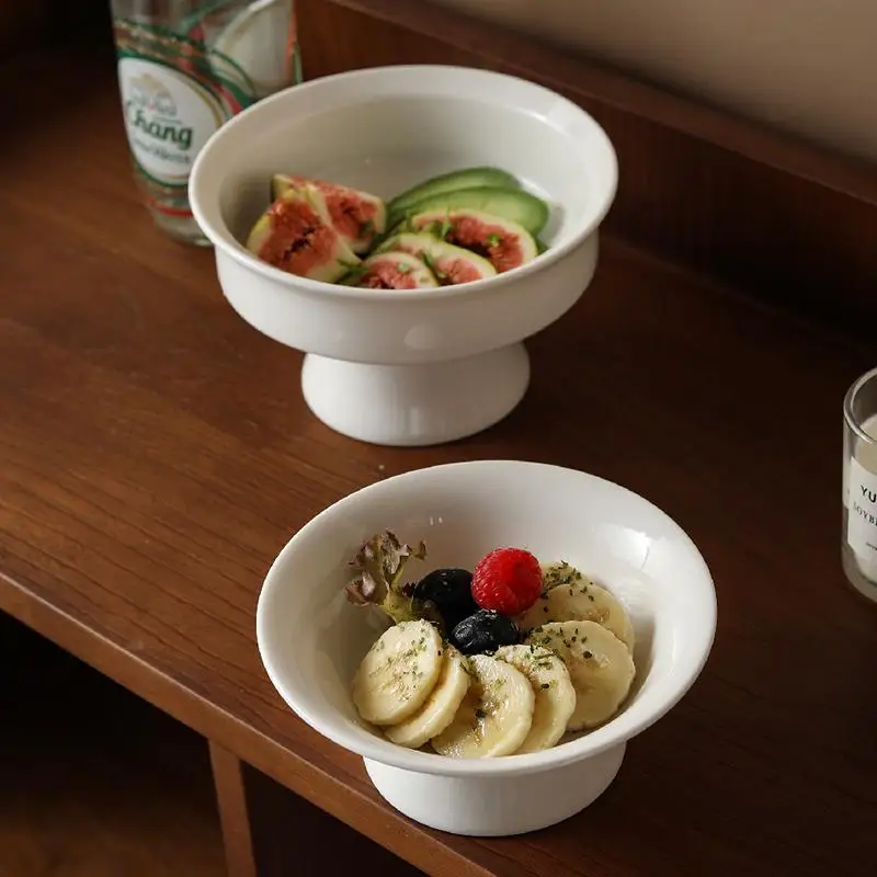 Ceramic dessert dish Household pure white bowls palace style high footed dessert bowl Artistic conception restaurant tableware
Ceramic dessert dish Household pure white bowls palace style high footed dessert bowl Artistic conception restaurant tableware