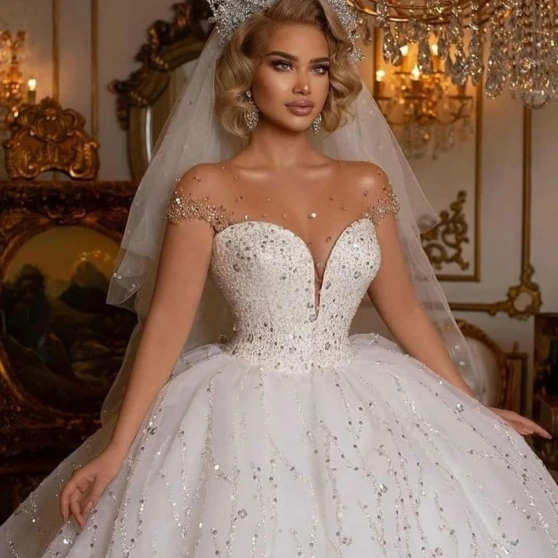Gaun pernikahan payet mewah untuk wanita gaun bola putri topi manik-manik Tulle tipis gaun pengantin jubah De Mariee
Gaun pernikahan payet mewah untuk wanita gaun bola putri topi manik-manik Tulle tipis gaun pengantin jubah De Mariee