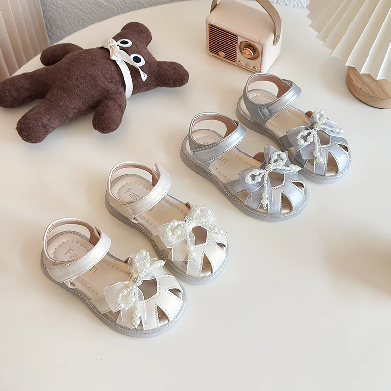 Girls Pearl Bow Princess Sandals Summer Kids Shoes Soft Anti-Slip Children Beach Sandals for Toddler Girl White Silver Shoes
Girls Pearl Bow Princess Sandals Summer Kids Shoes Soft Anti-Slip Children Beach Sandals for Toddler Girl White Silver Shoes