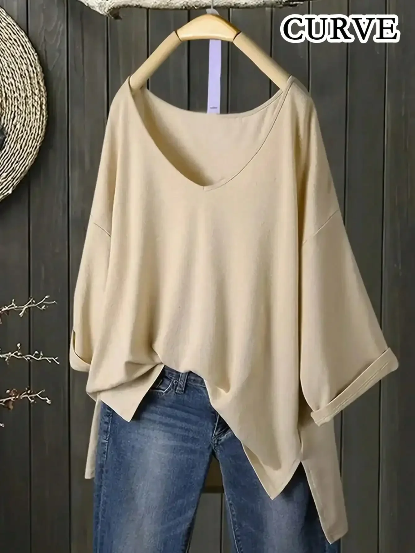 Женская повседневная однотонная футболка больших размеров 1XL-5XL с длинными рукавами, женская модная свободная футболка с рукавами 3/4 и v-образным вырезом с разрезом
Женская повседневная однотонная футболка больших размеров 1XL-5XL с длинными рукавами, женская модная свободная футболка с рукавами 3/4 и v-образным вырезом с разрезом