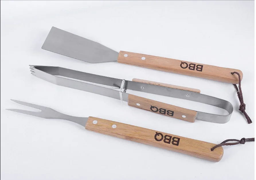 Combination of three-piece stainless steel wooden handle fork shovel outdoor barbecue tools
Combination of three-piece stainless steel wooden handle fork shovel outdoor barbecue tools