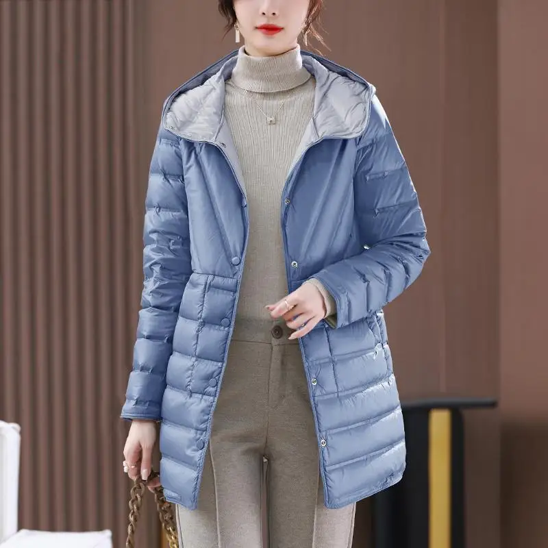 Женская двусторонняя куртка из утиного пуха свободного кроя средней длины, зимнее пальто в милом стиле с пуговицами, полиэстер
Женская двусторонняя куртка из утиного пуха свободного кроя средней длины, зимнее пальто в милом стиле с пуговицами, полиэстер