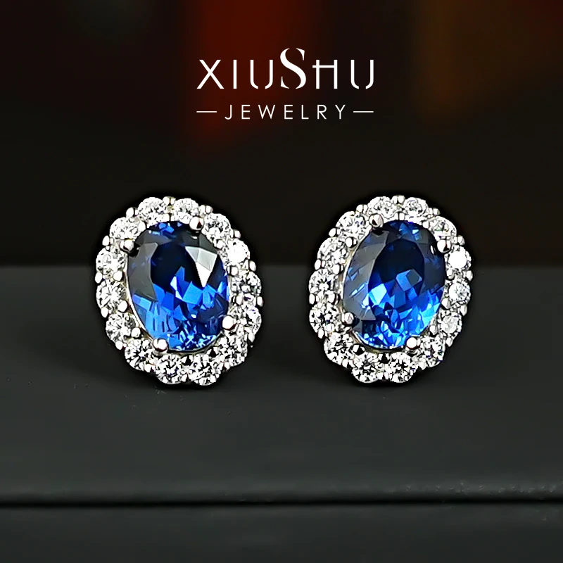 Fashion Red and Blue Ear Stud Oval Pigeon Egg Four Claws Inlay High Carbon Diamond 925 Silver Plated 18K Gold Women's earrings
Fashion Red and Blue Ear Stud Oval Pigeon Egg Four Claws Inlay High Carbon Diamond 925 Silver Plated 18K Gold Women's earrings