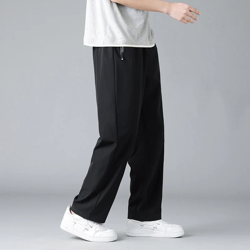 2025 New men's casual wide-legged pants solid color elastic waist pants zipper pockets lightweight quick dry casual sports
2025 New men's casual wide-legged pants solid color elastic waist pants zipper pockets lightweight quick dry casual sports