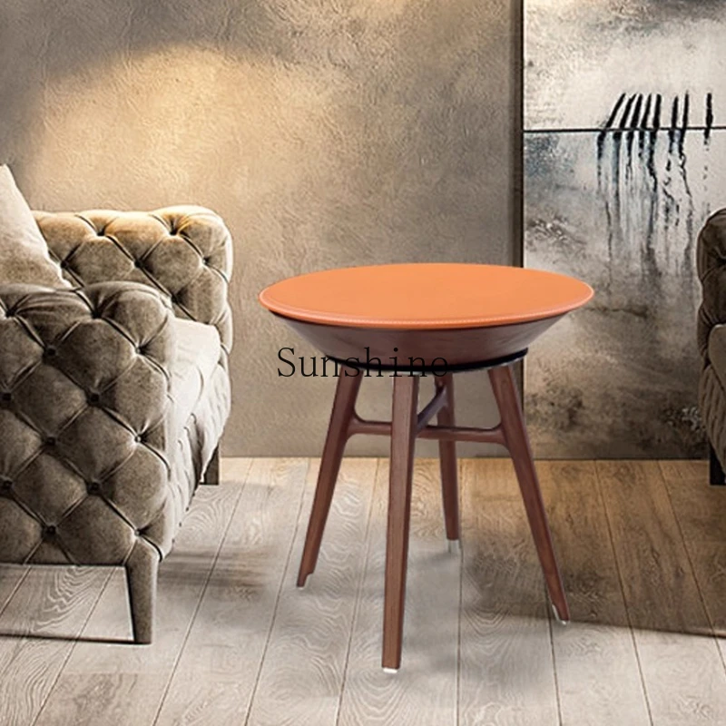 Italian high-end saddle leather round coffee table simple creative solid wood rotating edge table
Italian high-end saddle leather round coffee table simple creative solid wood rotating edge table
