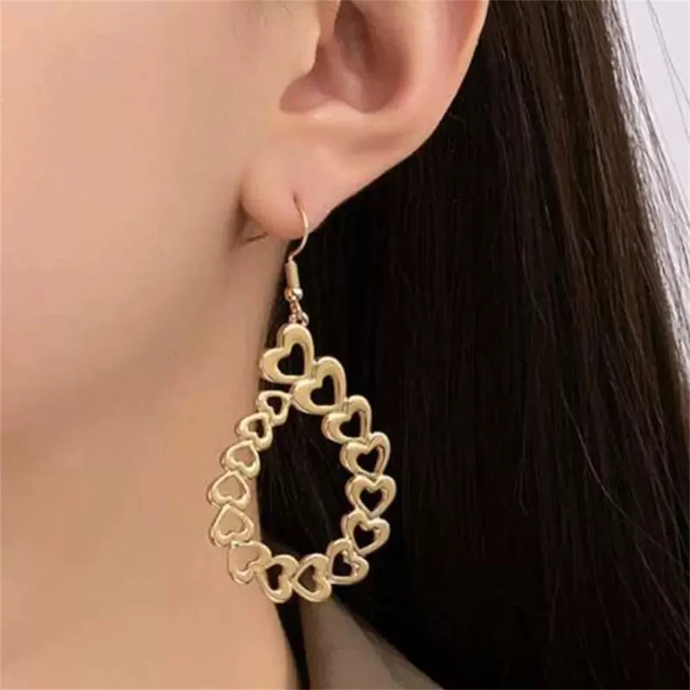 Elegance Hollow Heart-Shaped Women's Oval Earrings Fashion Luxury Metal Dangle Earrings Jewelry Accessory Valentine's Day Gift
Elegance Hollow Heart-Shaped Women's Oval Earrings Fashion Luxury Metal Dangle Earrings Jewelry Accessory Valentine's Day Gift