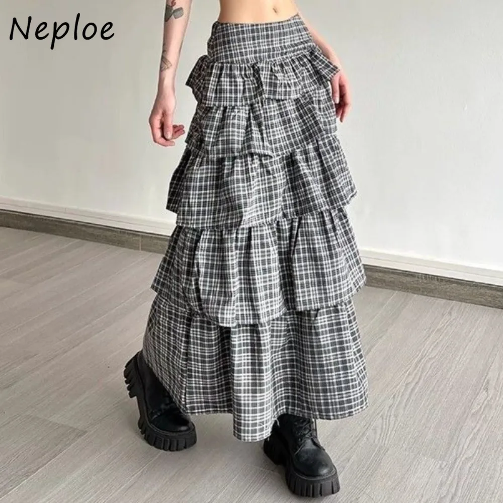 Neploe Advanced Plaid Moda Юбка-торт Новые тонкие универсальные женские юбки меньшинства Свободные элегантные винтажные пригородные юбки средней длины Falda 
Neploe Advanced Plaid Moda Юбка-торт Новые тонкие универсальные женские юбки меньшинства Свободные элегантные винтажные пригородные юбки средней длины Falda
