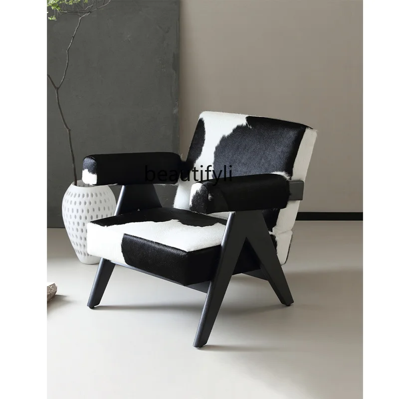 Italian minimalist sofa chair single retro solid wood leisure chair, milk cowhide living room light luxury negotiation
Italian minimalist sofa chair single retro solid wood leisure chair, milk cowhide living room light luxury negotiation