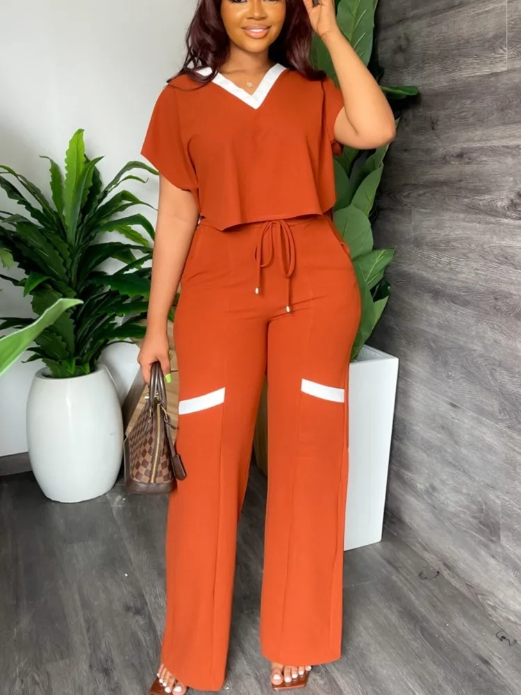 Elegant Women Casual Short Sleeve T-shirt Sports Suit Summer Fashion Solid V Neck Short Top & Straight Pants Two Piece Sets
Elegant Women Casual Short Sleeve T-shirt Sports Suit Summer Fashion Solid V Neck Short Top & Straight Pants Two Piece Sets