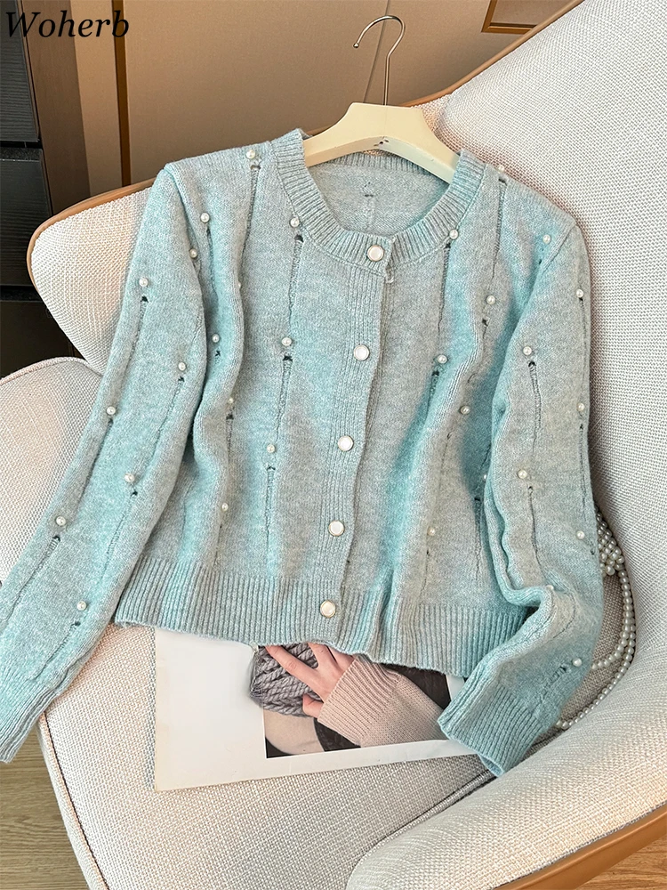 Knitted Cardigan Autumn Women Clothing O-neck Pearl Vintage Sueter Mujer Fashion Hole Knitwear Sweater Tops Korean Pull Femme
Knitted Cardigan Autumn Women Clothing O-neck Pearl Vintage Sueter Mujer Fashion Hole Knitwear Sweater Tops Korean Pull Femme
