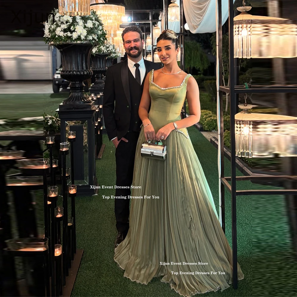 Xijun Gogerous Sage Green Вечерние платья на тонких бретельках с кристаллами и рюшами Пром платья без рукавов А-силуэта Вечерние платья для выпускного вечера на заказ
Xijun Gogerous Sage Green Вечерние платья на тонких бретельках с кристаллами и рюшами Пром платья без рукавов А-силуэта Вечерние платья для выпускного вечера на заказ