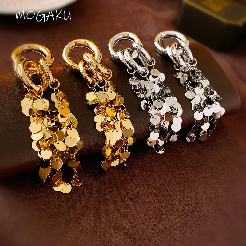 MOGAKU Fashion Round Sequins Tassel Earring for Women Gold Color Metal Hollow Out Drop Hanging Earrings Ladies Party Jewelry
MOGAKU Fashion Round Sequins Tassel Earring for Women Gold Color Metal Hollow Out Drop Hanging Earrings Ladies Party Jewelry