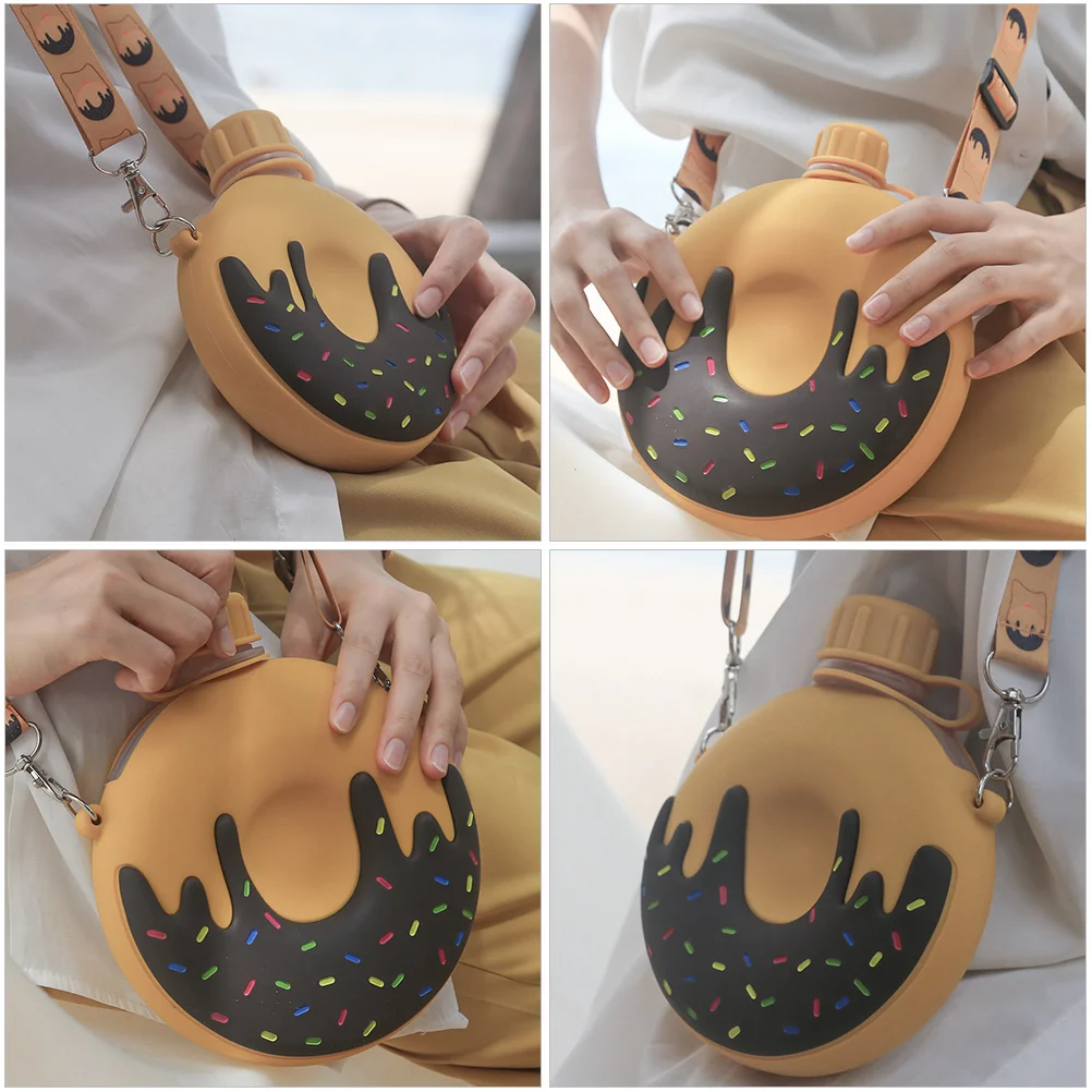 Silicone Water Bottle Cute Doughnut Design Portable Kids Drinking Cup Leakproof Yellow Soft Handle Comfortable Strap for Kids
Silicone Water Bottle Cute Doughnut Design Portable Kids Drinking Cup Leakproof Yellow Soft Handle Comfortable Strap for Kids