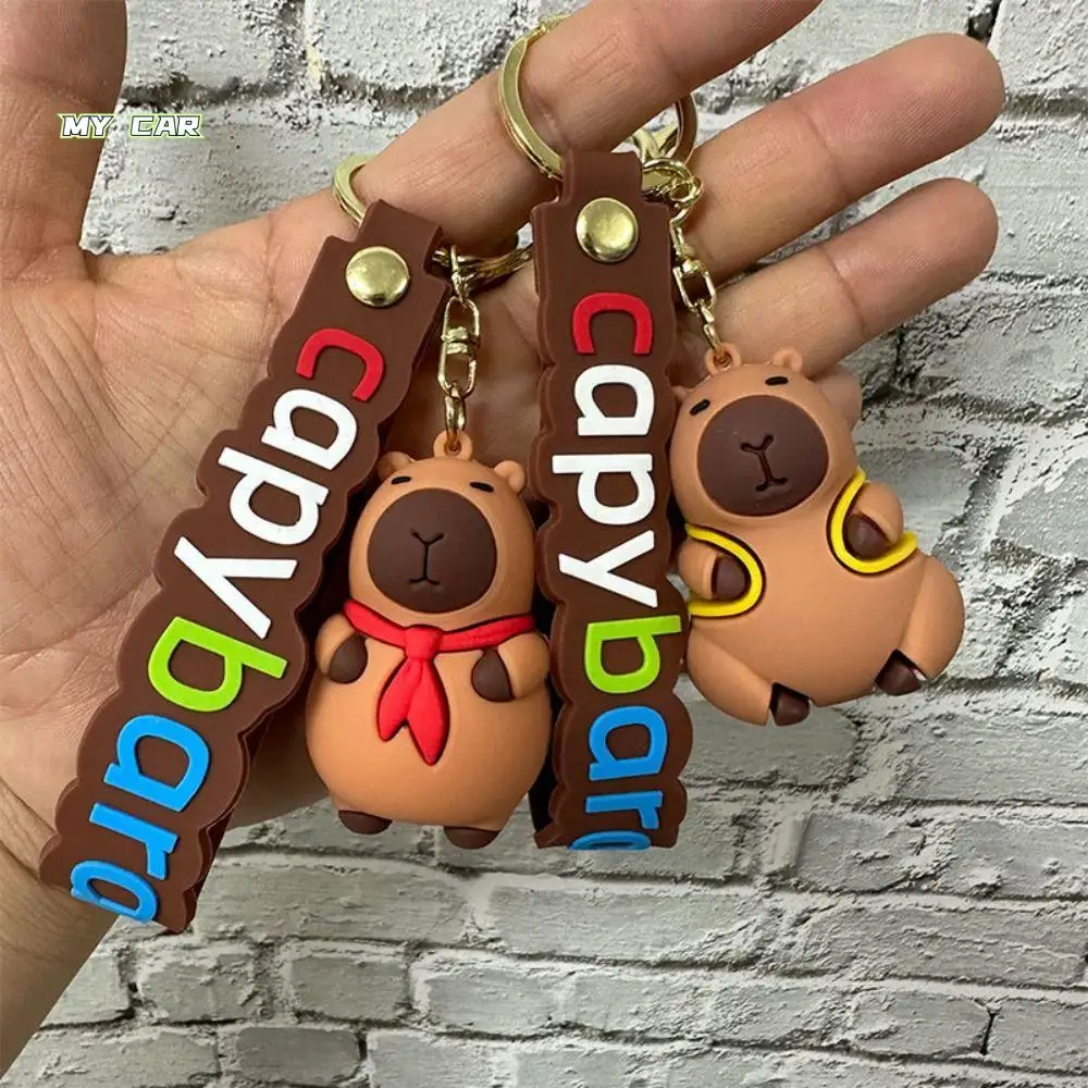 Забавный брелок для ключей с капибарой из ПВХ, умный водонепроницаемый брелок с рисунком капибары, мягкий клейкий легкий кулон с изображением животного, капибары для девочек
Забавный брелок для ключей с капибарой из ПВХ, умный водонепроницаемый брелок с рисунком капибары, мягкий клейкий легкий кулон с изображением животного, капибары для девочек