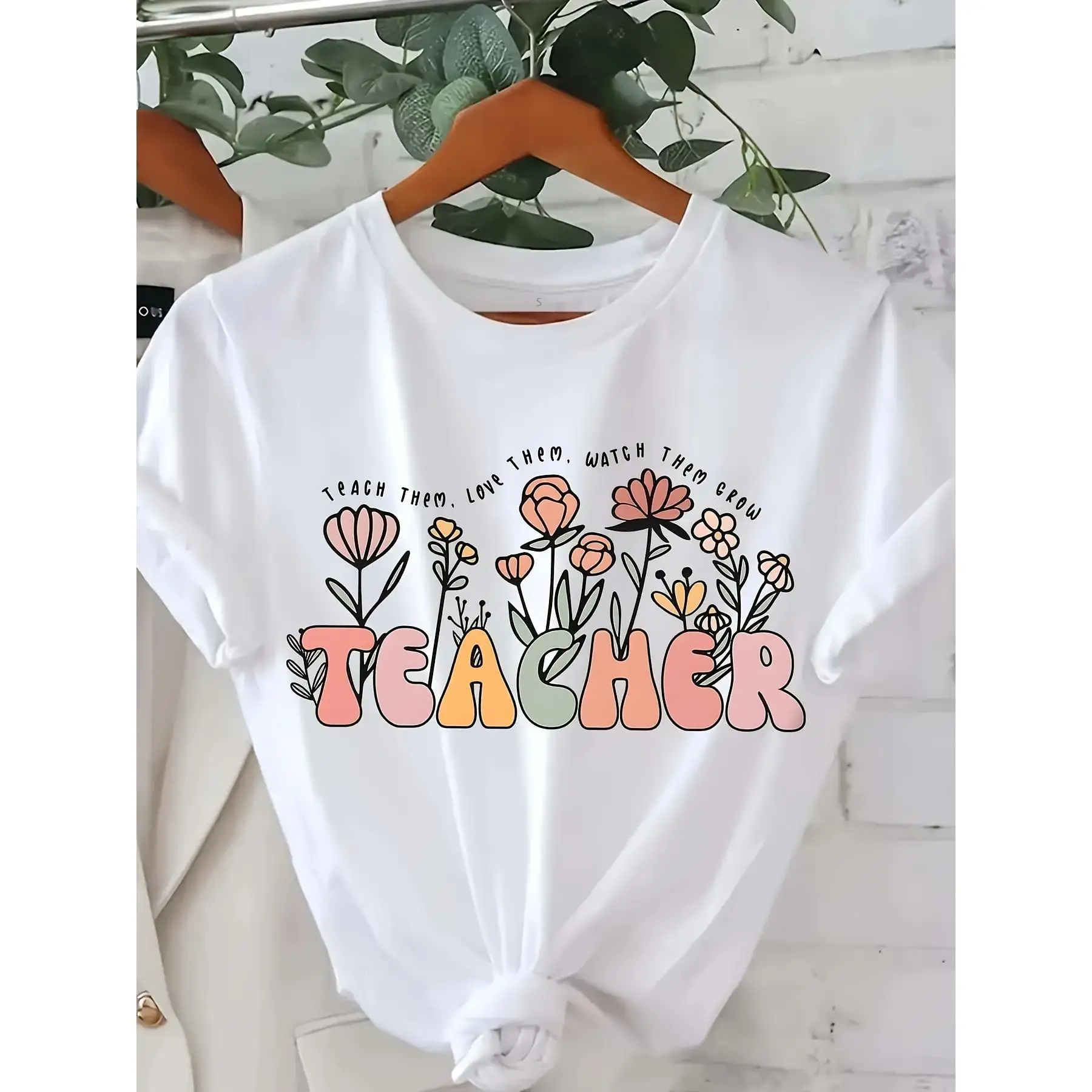 Teacher T-Shirt Teach Them Love Them Watch Them Grow Floral Graphic Tee Women's Retro Boho Style Gift for Teachers
Teacher T-Shirt Teach Them Love Them Watch Them Grow Floral Graphic Tee Women's Retro Boho Style Gift for Teachers