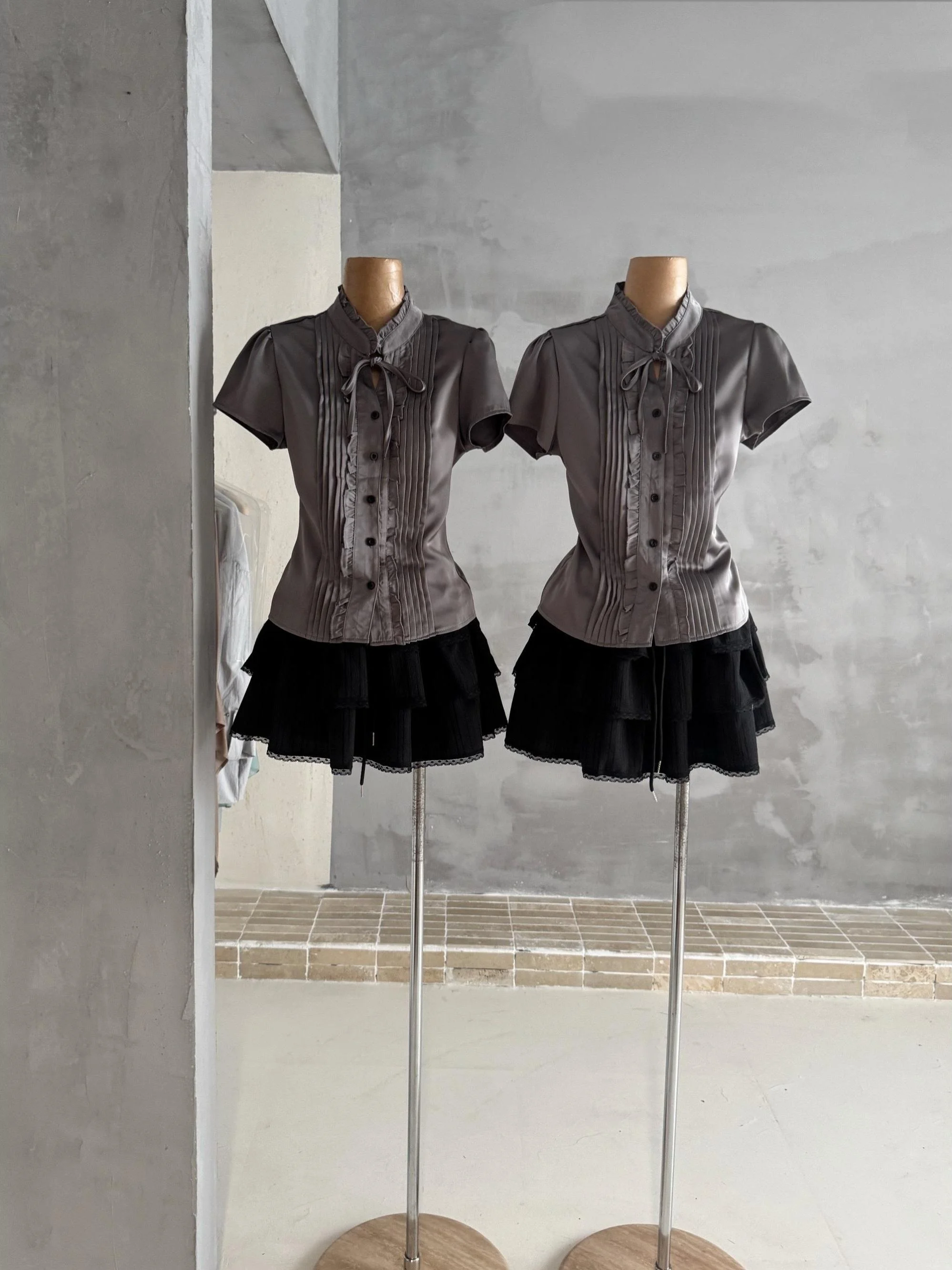Elegant Short Sleeve Blouse And High Waist Skirt Two Piece Set for Women in Summer Fashion Semi-Formal Wear by Thirteen Rows
Elegant Short Sleeve Blouse And High Waist Skirt Two Piece Set for Women in Summer Fashion Semi-Formal Wear by Thirteen Rows