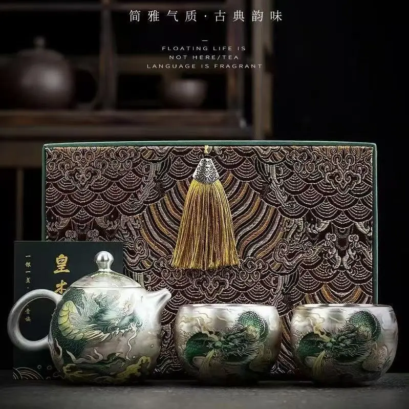 Hxl gilt silver tea set kung fu tea set one pot two cups tea set suit
Hxl gilt silver tea set kung fu tea set one pot two cups tea set suit