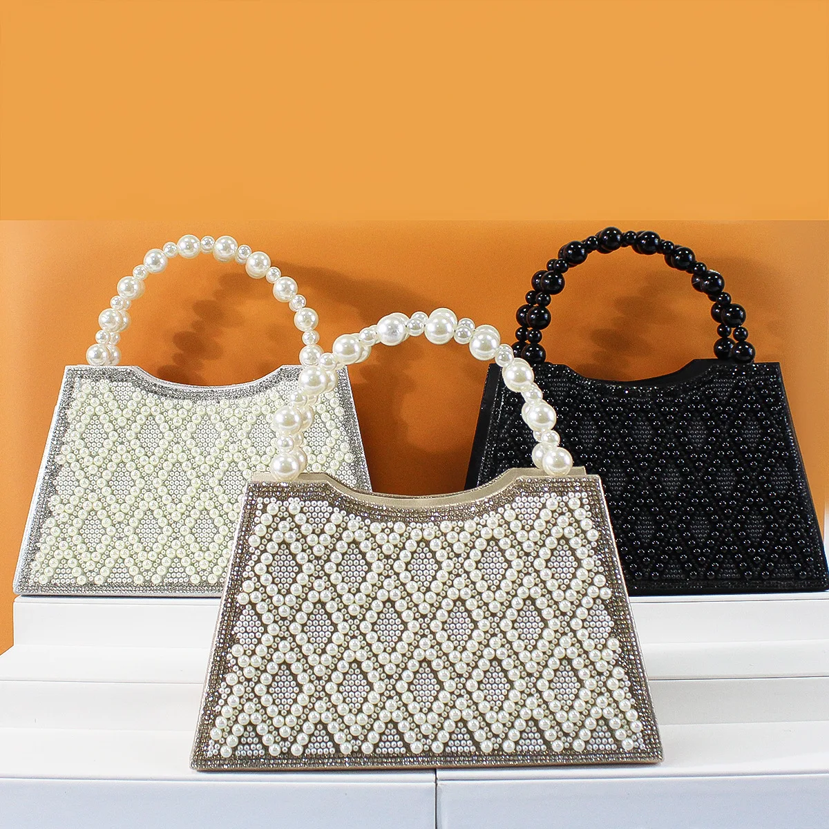 2025 Роскошный высококачественный женский вечерний клатч с жемчугом и бриллиантами, модный дизайн, большая вместительная сумка для свадебной вечеринки, сумка на плечо
2025 Роскошный высококачественный женский вечерний клатч с жемчугом и бриллиантами, модный дизайн, большая вместительная сумка для свадебной вечеринки, сумка на плечо