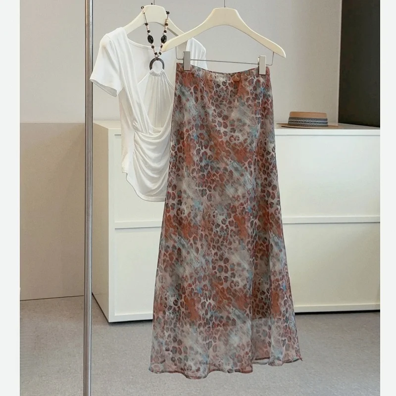 High-end vintage gold leopard print skirt for women, new summer style, fashionable and slimming fishtail designADraped long skir
High-end vintage gold leopard print skirt for women, new summer style, fashionable and slimming fishtail designADraped long skir