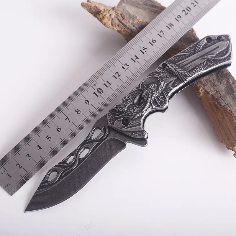Embossed steel handle folding knife outdoor high hardness stainless steel knife camping portable self-defense knif
Embossed steel handle folding knife outdoor high hardness stainless steel knife camping portable self-defense knif