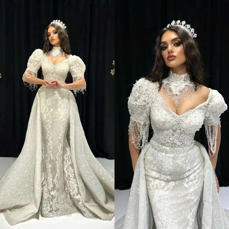 Винтажное свадебное платье-футляр с высоким воротом, элегантное, с короткими рукавами, расшитое пайетками, со съемным шлейфом, на заказ (vestido de novia)
Винтажное свадебное платье-футляр с высоким воротом, элегантное, с короткими рукавами, расшитое пайетками, со съемным шлейфом, на заказ (vestido de novia)