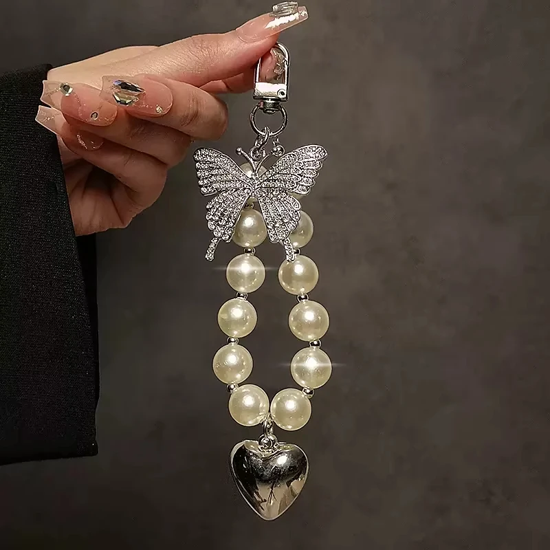 INS Butterfly Pearl Beaded Keychain Bracelet Lanyard Phone Charm For iPhone Samsung Cute Love Heart Camera Anti-Lost Wrist Strap
INS Butterfly Pearl Beaded Keychain Bracelet Lanyard Phone Charm For iPhone Samsung Cute Love Heart Camera Anti-Lost Wrist Strap