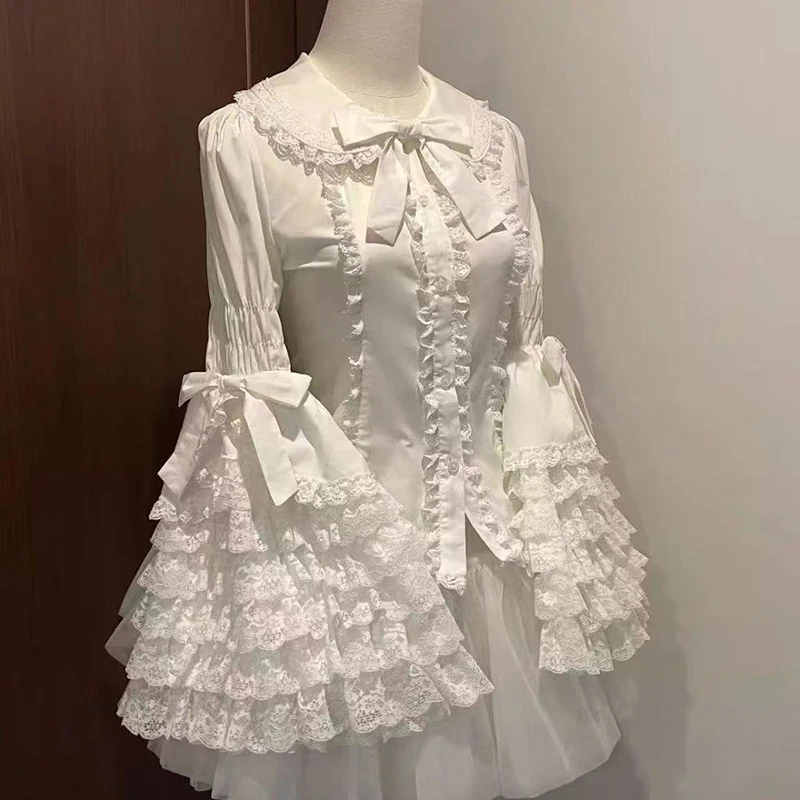 Japanese Lolita Women Shirt Sweet Bow Lace Patchwork Ruffles Flare Long Sleeve Blouse Peter Pan Collar Aesthetic Inner Wear Tops
Japanese Lolita Women Shirt Sweet Bow Lace Patchwork Ruffles Flare Long Sleeve Blouse Peter Pan Collar Aesthetic Inner Wear Tops