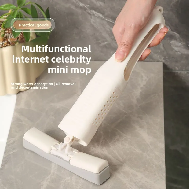 Mini mop replaces cloth, multifunctional desktop, no hand washing, sponge, absorbent, can be hung for cleaning
Mini mop replaces cloth, multifunctional desktop, no hand washing, sponge, absorbent, can be hung for cleaning