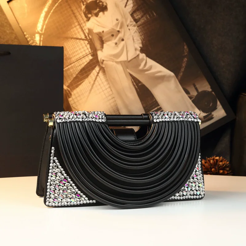 Spring and summer new rhinestone temperament dinner noodle bag high-end one-shoulder cross-body handbag women's small square bag
Spring and summer new rhinestone temperament dinner noodle bag high-end one-shoulder cross-body handbag women's small square bag
