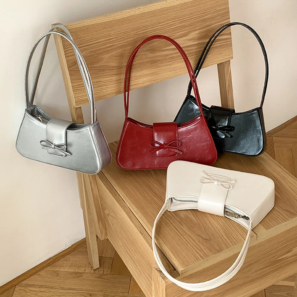 Sweet Bow Y2K Purse PU Leather Fashion Handbag with Zipper Closure Everyday Purse Trendy Underarm Bag for Women and Girls
Sweet Bow Y2K Purse PU Leather Fashion Handbag with Zipper Closure Everyday Purse Trendy Underarm Bag for Women and Girls
