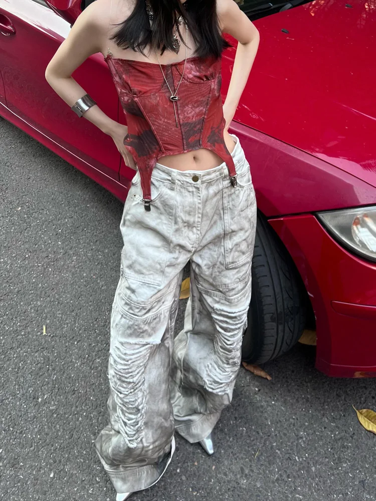American style distressed heavy industry washed ripped denim pants female punk spicy girl wasteland style dirty dyed floor pants
American style distressed heavy industry washed ripped denim pants female punk spicy girl wasteland style dirty dyed floor pants