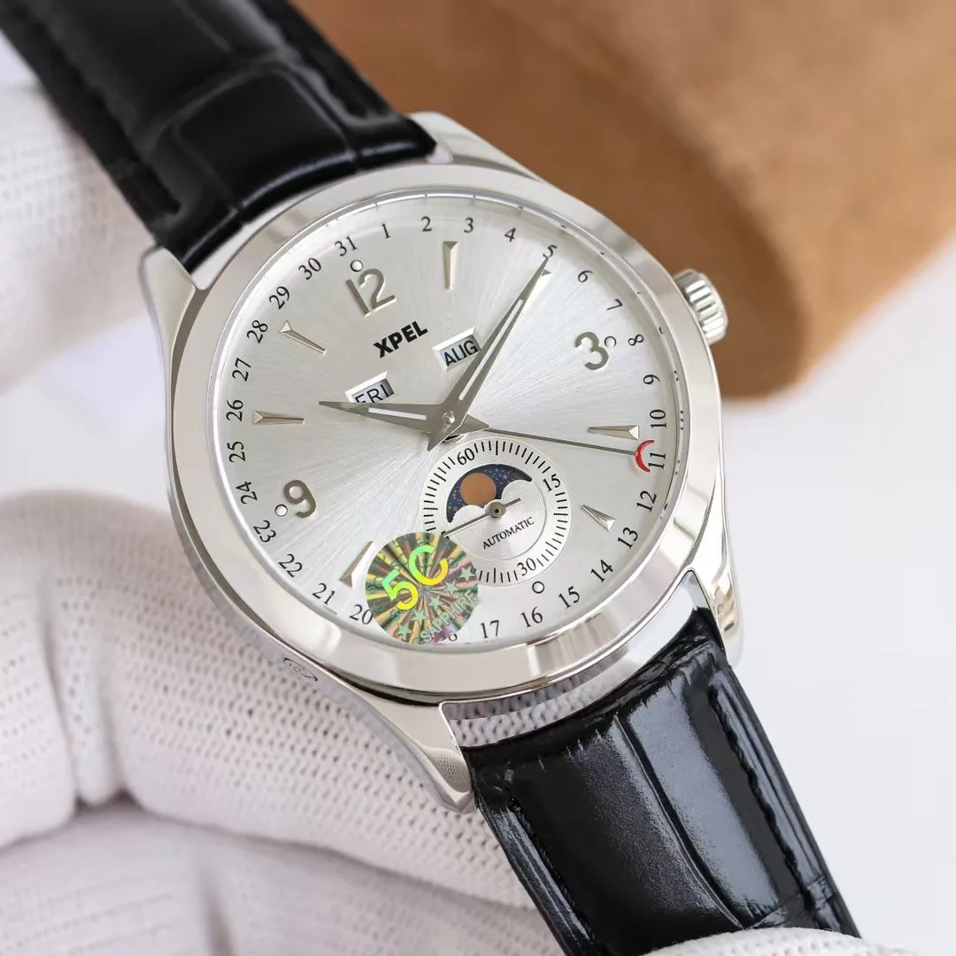 Мужской автоматический вечный календарь с фазой Луны, настраиваемый стиль, логотип бренда, ремешок из телячьей кожи, сапфировое стекло.
Мужской автоматический вечный календарь с фазой Луны, настраиваемый стиль, логотип бренда, ремешок из телячьей кожи, сапфировое стекло.