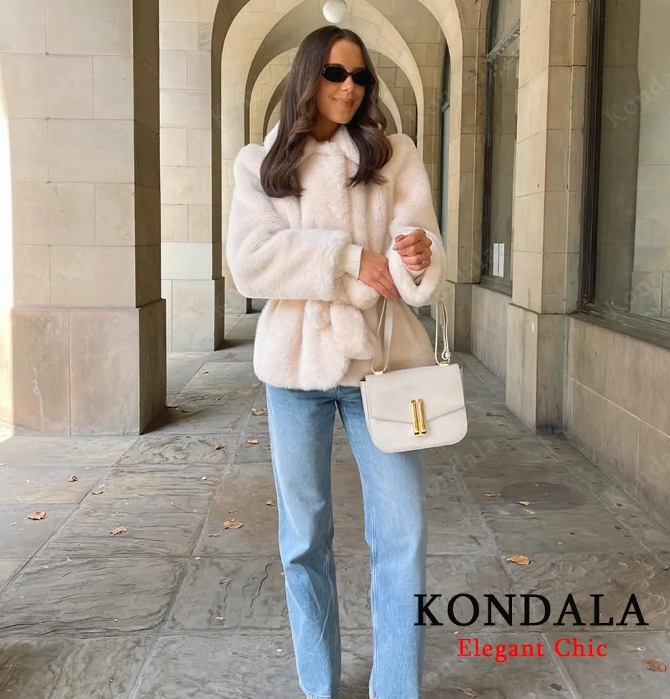 KONDALA женское осенне-зимнее элегантное пальто с поясом из искусственного меха, бежевое теплое меховое короткое пальто с лацканами, 2025 г., модное повседневное женское пальто High Street
KONDALA женское осенне-зимнее элегантное пальто с поясом из искусственного меха, бежевое теплое меховое короткое пальто с лацканами, 2025 г., модное повседневное женское пальто High Street