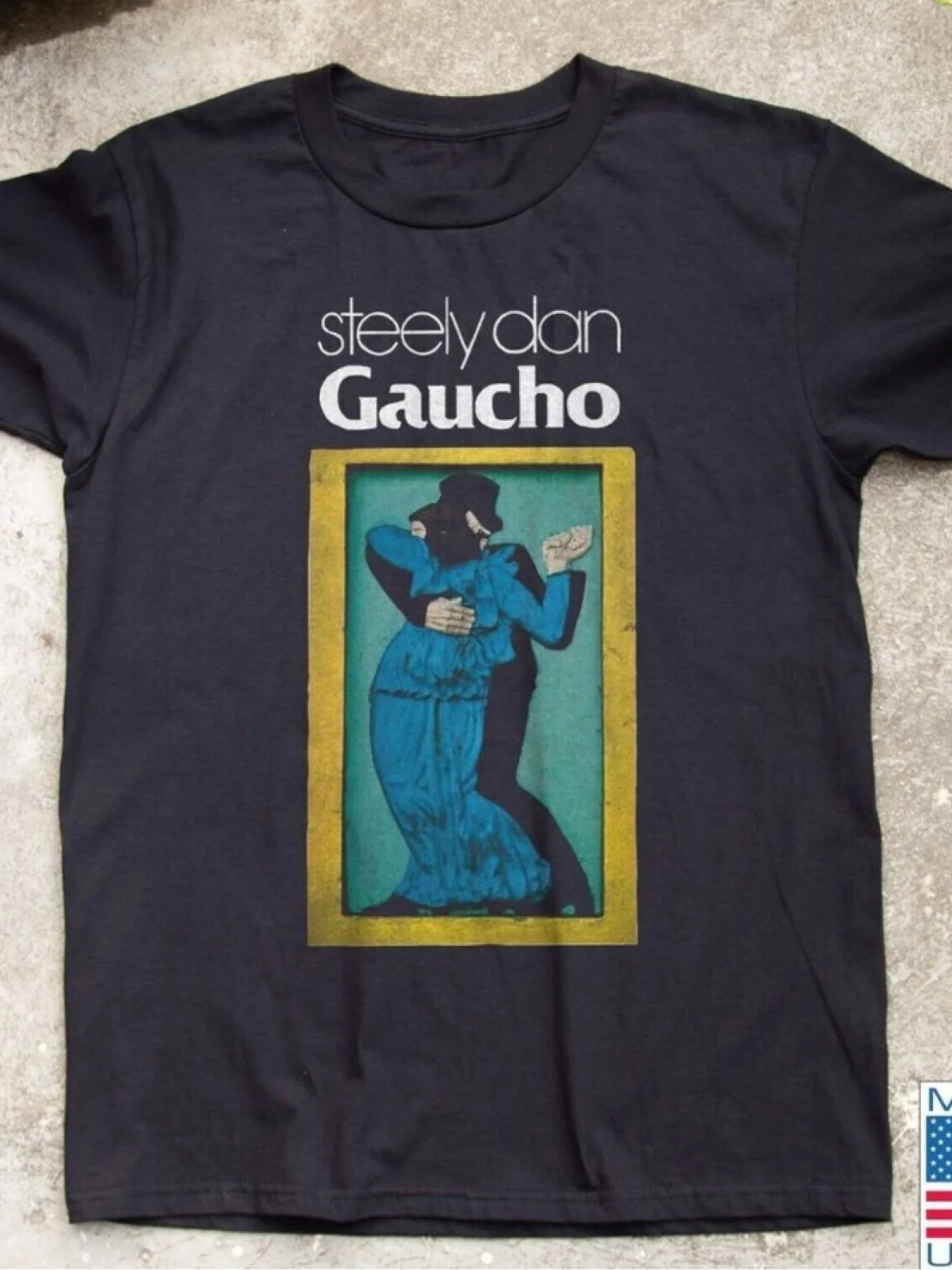 Steely Dan Gaucho Album Vintage 80s Graphic T-Shirt - Black Retro Band Tee with Geometric Artwork, Regular Fit Casual Shirt
Steely Dan Gaucho Album Vintage 80s Graphic T-Shirt - Black Retro Band Tee with Geometric Artwork, Regular Fit Casual Shirt