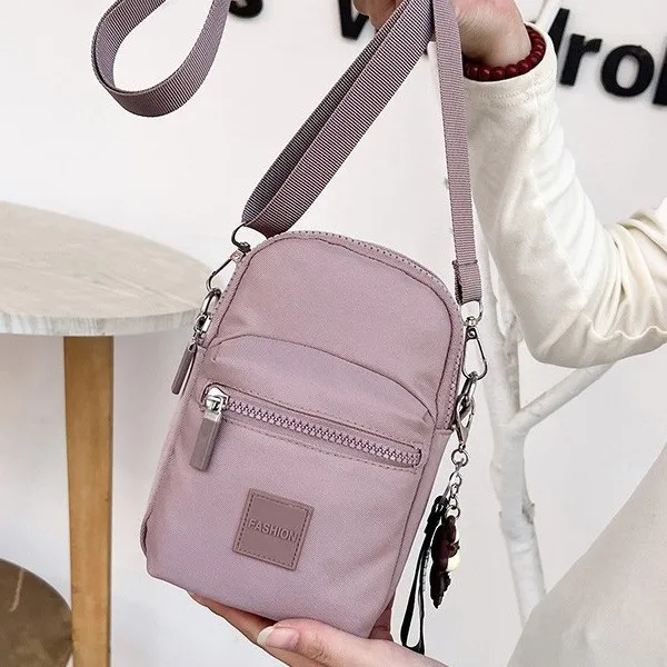 2025 Mini Crossbody Phone Bag - Cute Solid Color Shoulder Purse, Small Casual Sling Bag for Women, Versatile Walking Pouch
2025 Mini Crossbody Phone Bag - Cute Solid Color Shoulder Purse, Small Casual Sling Bag for Women, Versatile Walking Pouch
