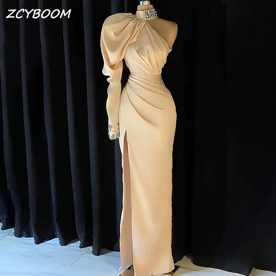 Elegant One Shoulder Mermaid Evening Dress 2025 Sexy High Side Slit Long Sleeves Dubai Sparkly Crystal Beading Women Prom Gowns
Elegant One Shoulder Mermaid Evening Dress 2025 Sexy High Side Slit Long Sleeves Dubai Sparkly Crystal Beading Women Prom Gowns