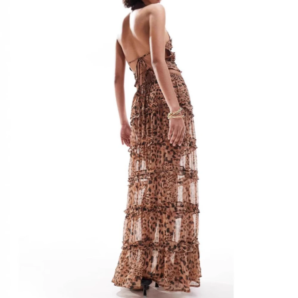 Женские платья в стиле бохо для пляжной вечеринки, сексуальная многоуровневая макси-юбка без рукавов с открытой спиной, укороченный топ, комплекты платьев с леопардовым принтом, летние платья, халат
Женские платья в стиле бохо для пляжной вечеринки, сексуальная многоуровневая макси-юбка без рукавов с открытой спиной, укороченный топ, комплекты платьев с леопардовым принтом, летние платья, халат