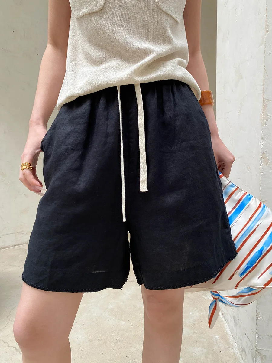 Summer women's casual solid color drawstring elastic waist loose wide leg shorts
Summer women's casual solid color drawstring elastic waist loose wide leg shorts