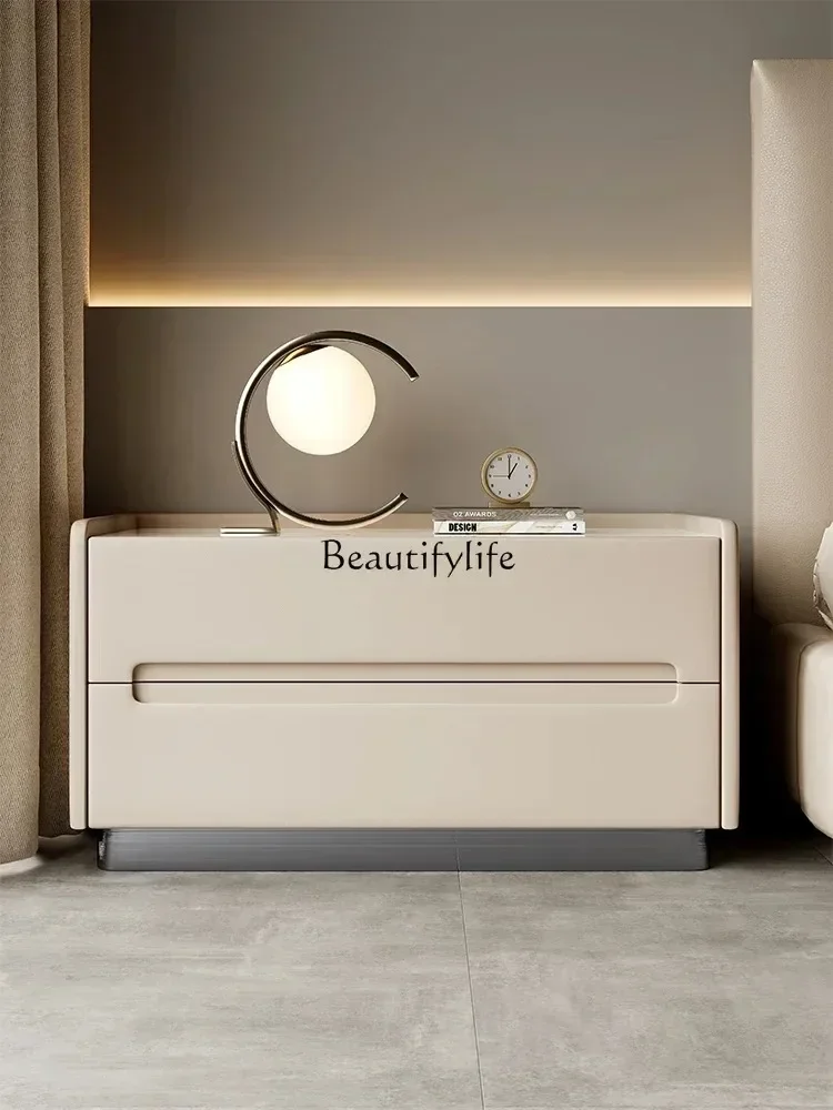 LXight luxury Italian cream wind solid wood rock slab leather locker bedside cabinet free installation 
LXight luxury Italian cream wind solid wood rock slab leather locker bedside cabinet free installation