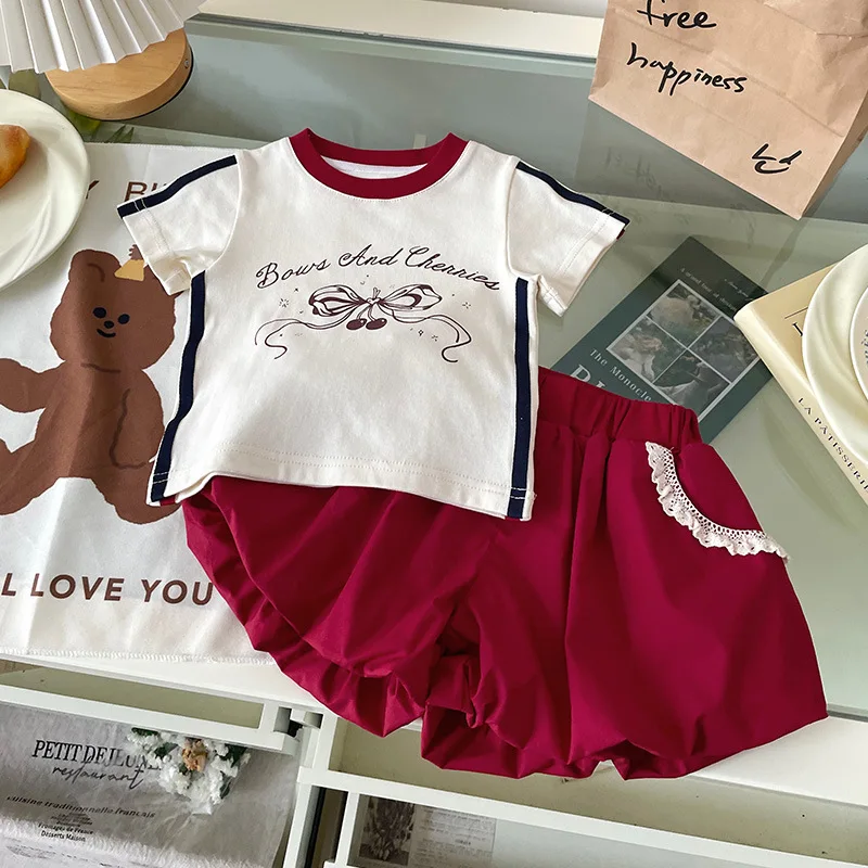 2025 Summer New Toddler Kids Girls Clothes Cute Cartoon Letter Bow Print Short Sleeve T Shirts and Red Shorts Clothing Set
2025 Summer New Toddler Kids Girls Clothes Cute Cartoon Letter Bow Print Short Sleeve T Shirts and Red Shorts Clothing Set