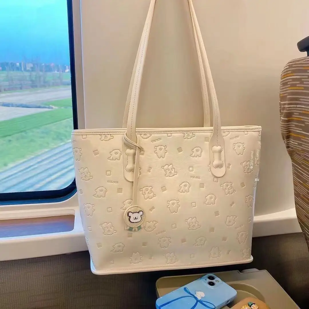 New Cute Dog Pattern Shoulder Bags Niche Versatile Commuting Large Capacity Hand-held Tote Bags Women's Fashion Popular HandBag
New Cute Dog Pattern Shoulder Bags Niche Versatile Commuting Large Capacity Hand-held Tote Bags Women's Fashion Popular HandBag