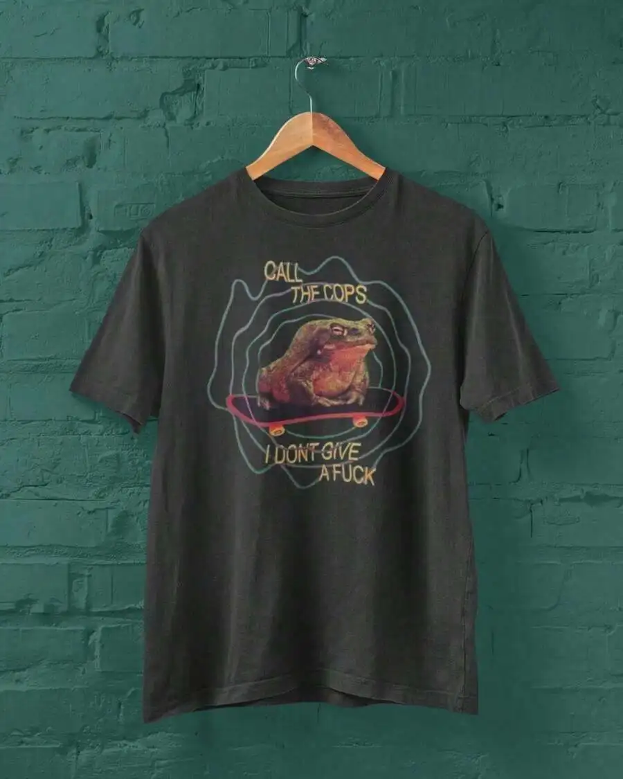Retro Graphic T-Shirt With Frog Skateboard Print Call The Cops I Dont Care Edgy 90s Vintage Unisex Cotton Tee
Retro Graphic T-Shirt With Frog Skateboard Print Call The Cops I Dont Care Edgy 90s Vintage Unisex Cotton Tee