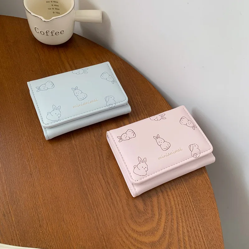 Short bow-shaped ladies' wallet, cartoon and cute three-fold multi-functional student loose change card holder wallet
Short bow-shaped ladies' wallet, cartoon and cute three-fold multi-functional student loose change card holder wallet