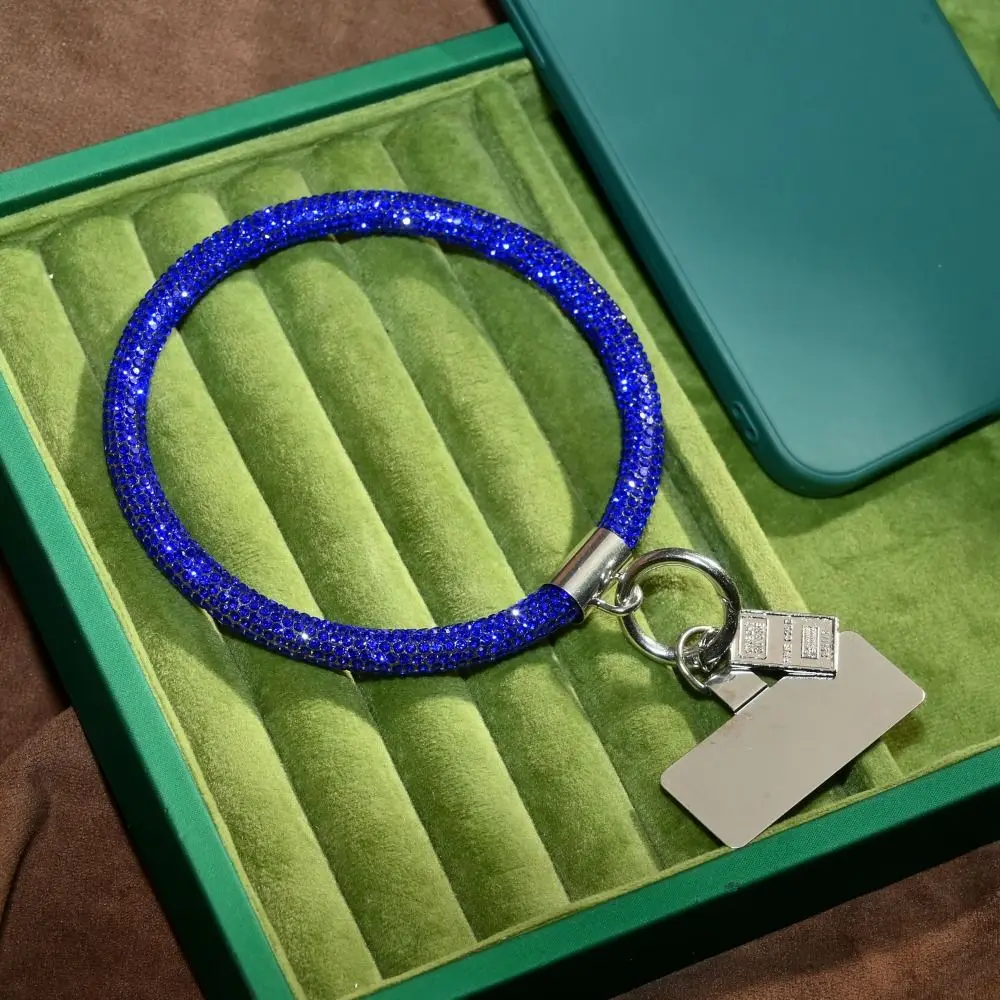 Роскошный блестящий ремешок для телефона с камнями, яркий и сияющий, на запястье, с эффектом бриллиантов, кристаллов, брелок для ключей, аксессуар для телефона
Роскошный блестящий ремешок для телефона с камнями, яркий и сияющий, на запястье, с эффектом бриллиантов, кристаллов, брелок для ключей, аксессуар для телефона